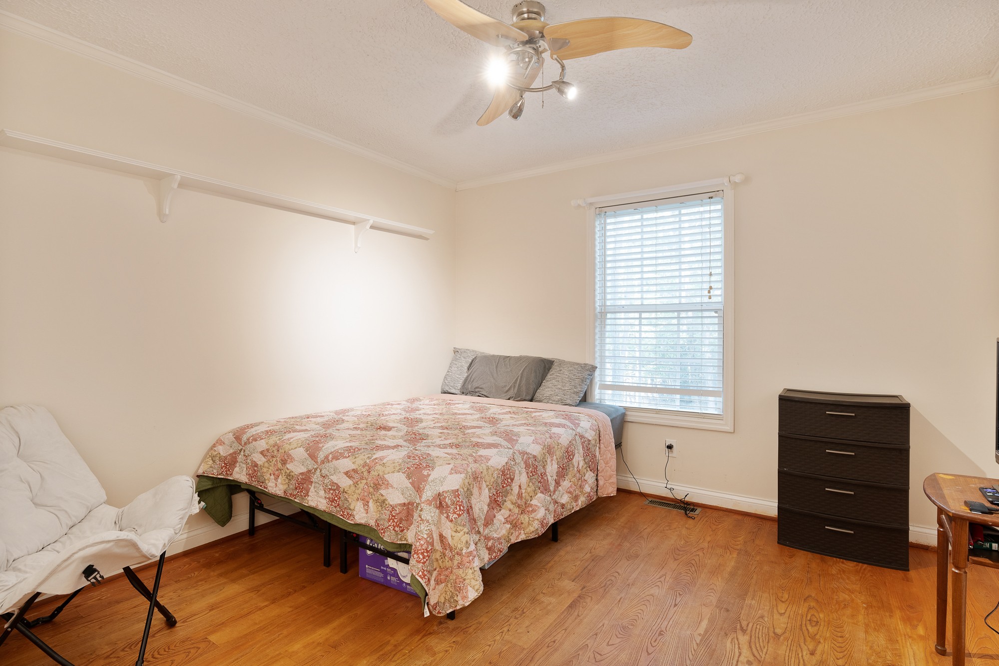 7511 Aubrey Ridge Place Fairview, TN 37062 - Photo 25 of 32 a bedroom with a bed and window