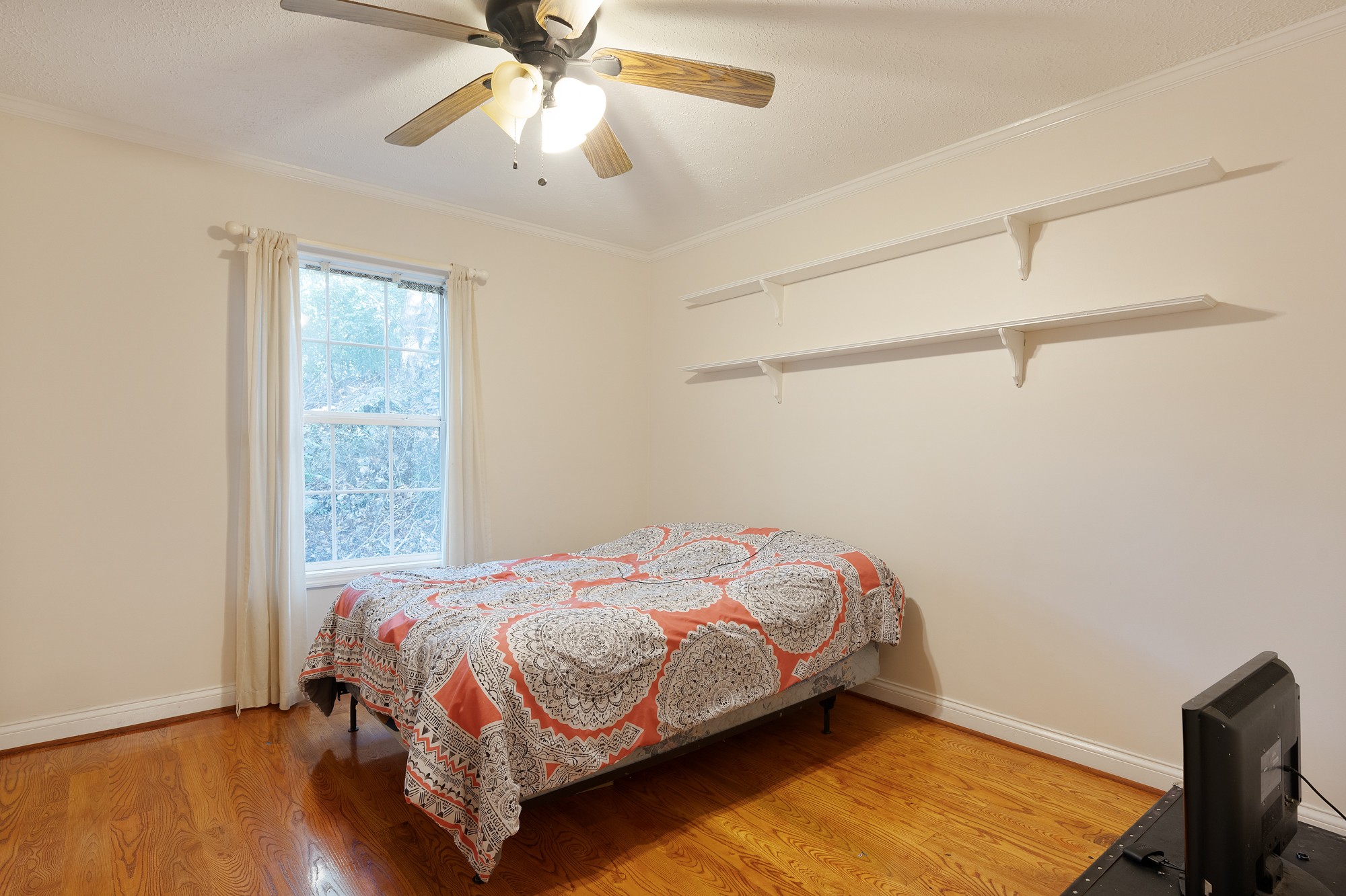 7511 Aubrey Ridge Place Fairview, TN 37062 - Photo 27 of 32 a bedroom with a bed and a window