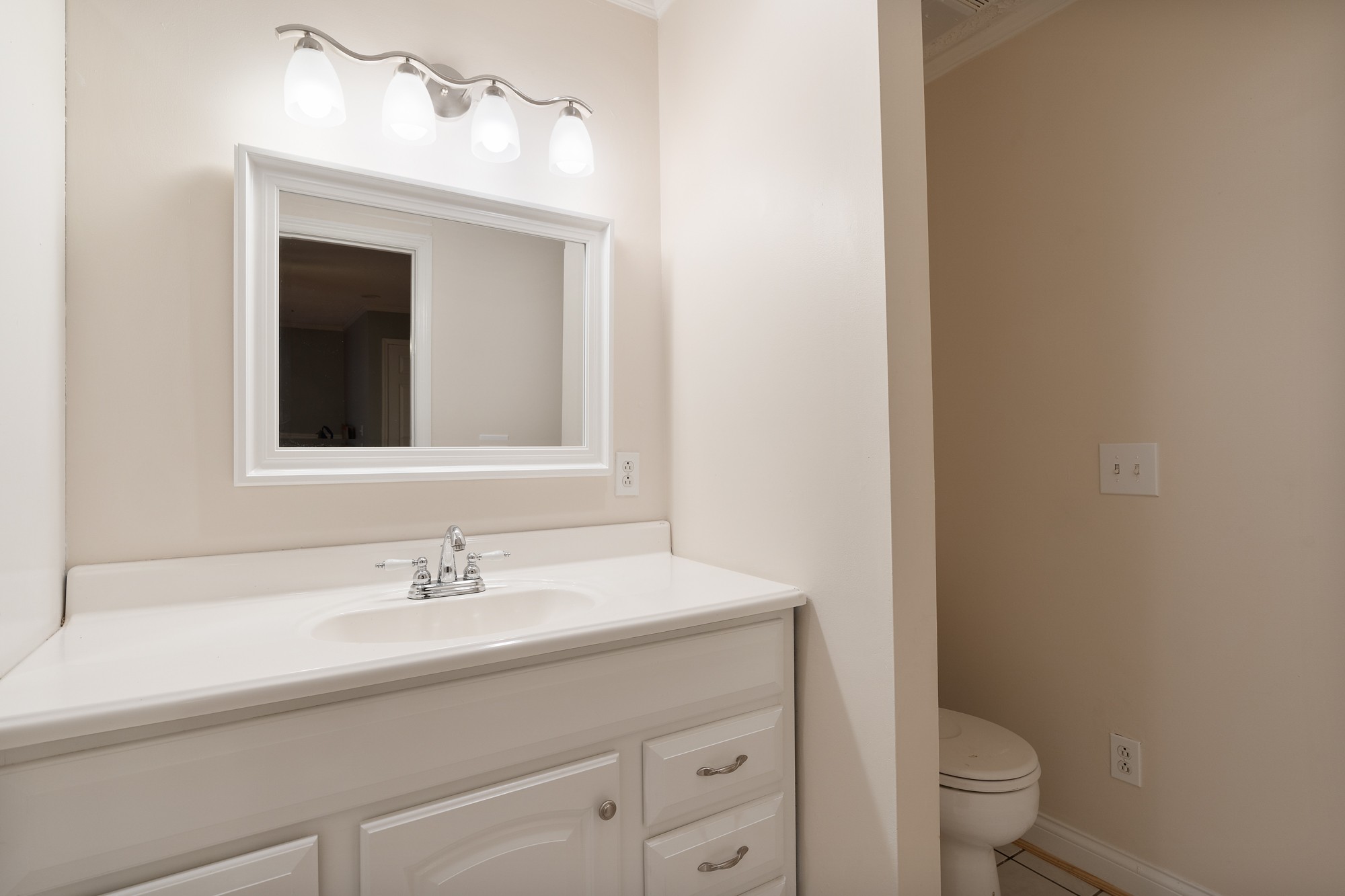 7511 Aubrey Ridge Place Fairview, TN 37062 - Photo 29 of 32 a bathroom with a sink a toilet and a mirror