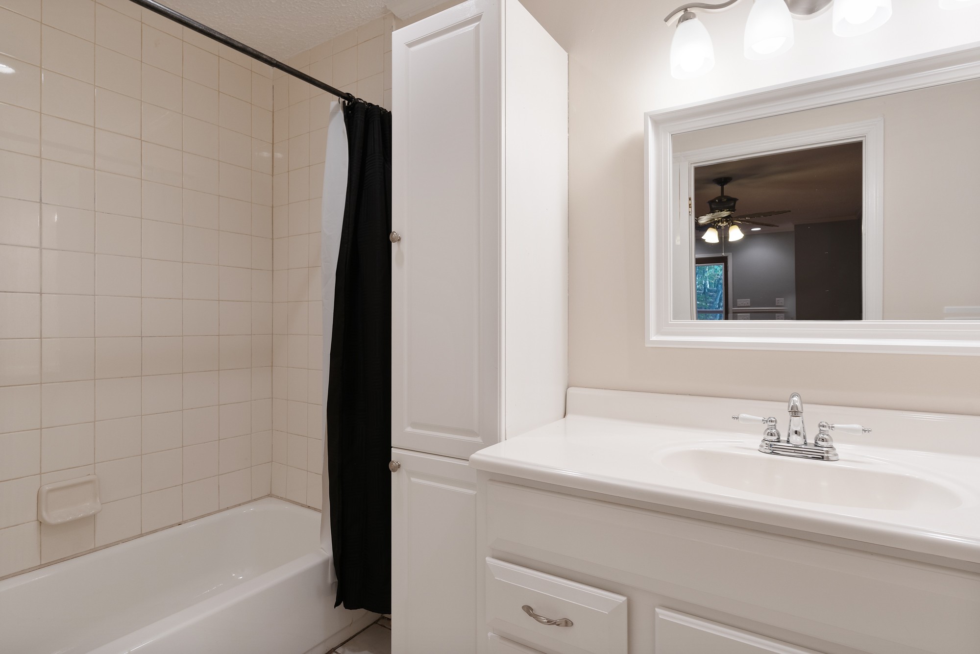 7511 Aubrey Ridge Place Fairview, TN 37062 - Photo 30 of 32 a bathroom with a sink a shower and a mirror