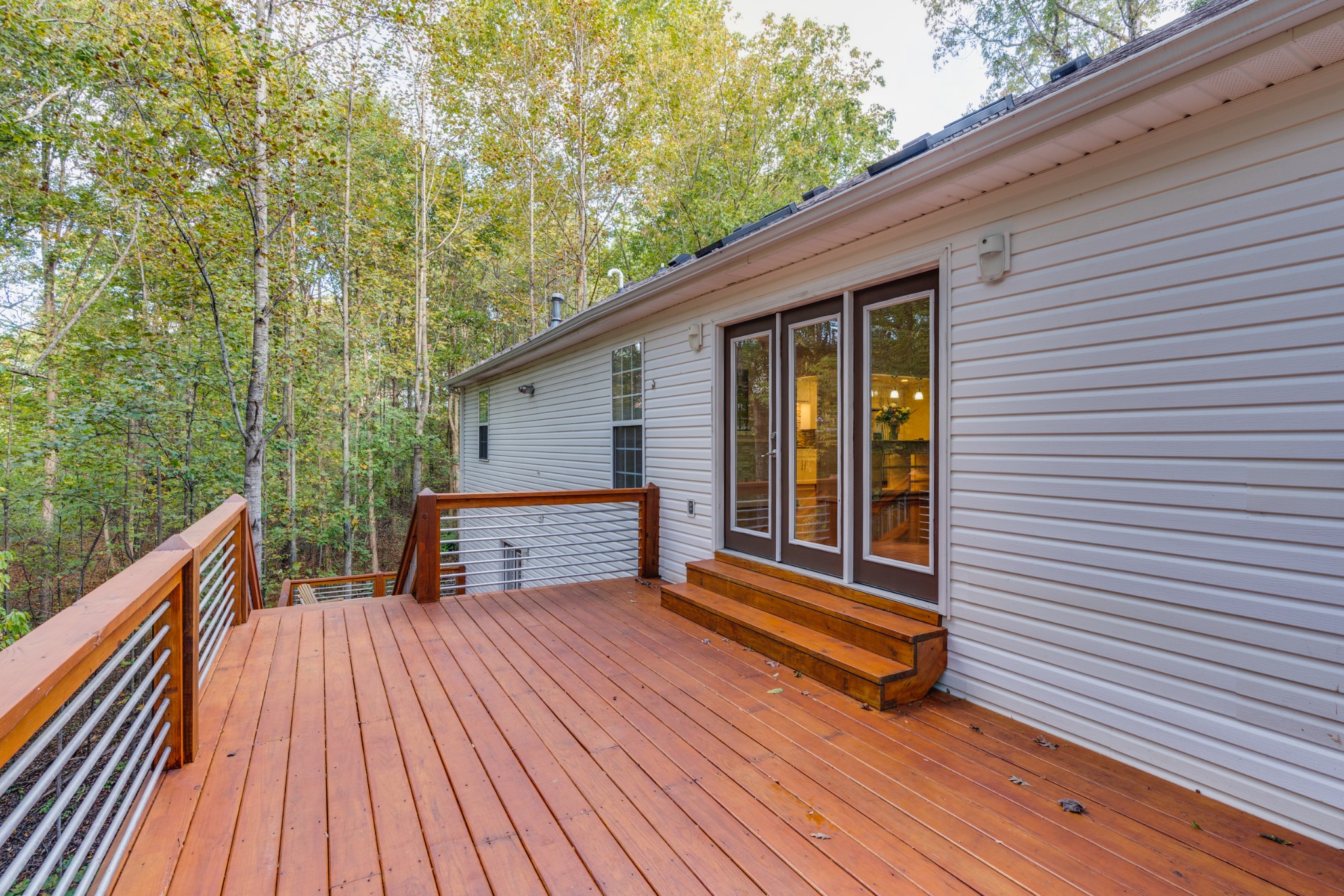 7511 Aubrey Ridge Place Fairview, TN 37062 - Photo 4 of 32 a view of outdoor space with deck and flat screen tv