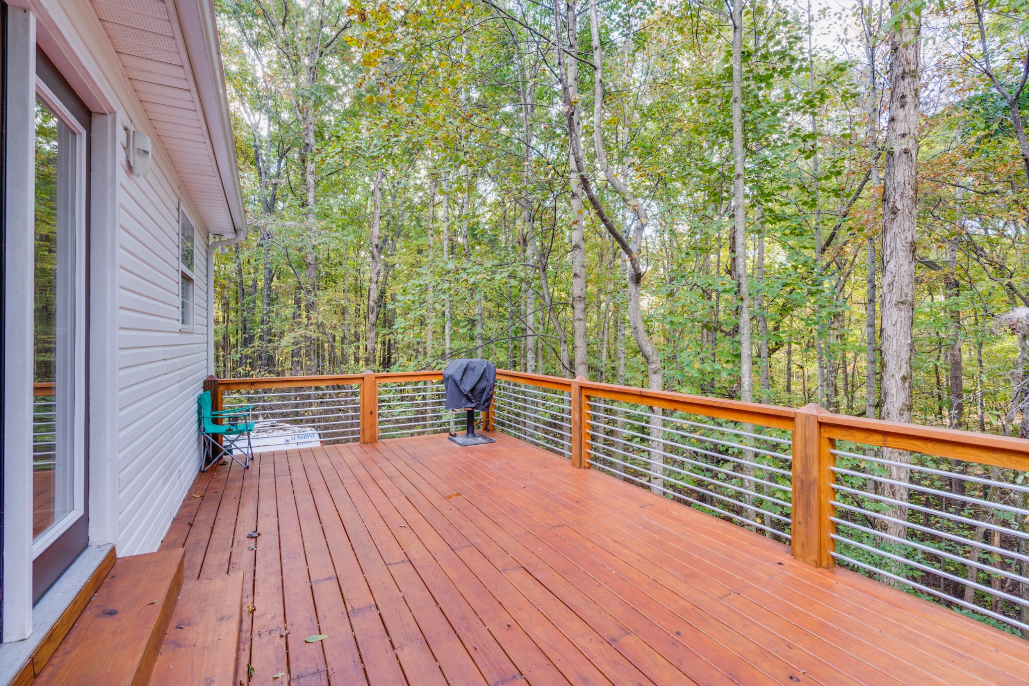 7511 Aubrey Ridge Place Fairview, TN 37062 - Photo 5 of 32 a view of backyard with deck and wooden floor