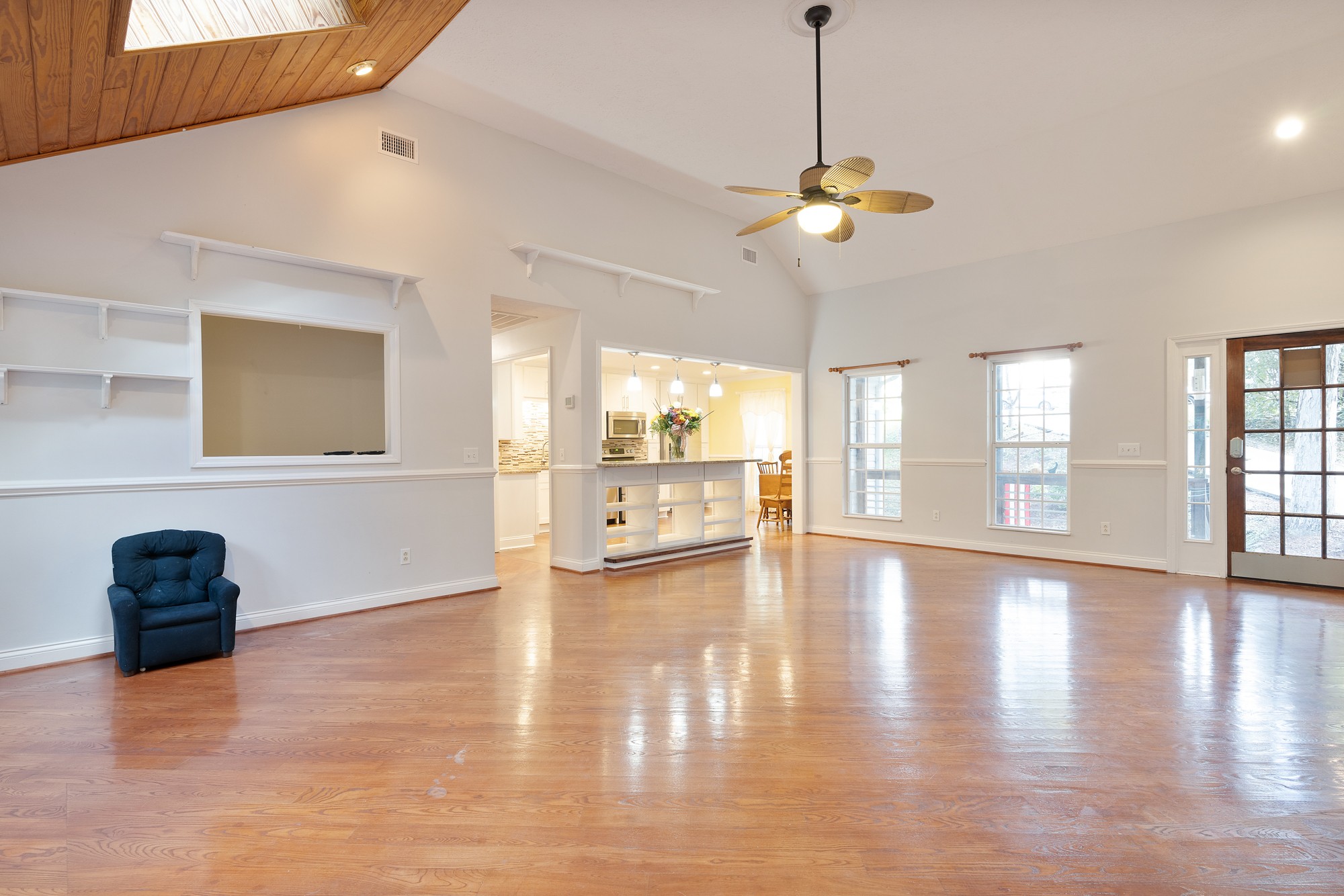 7511 Aubrey Ridge Place Fairview, TN 37062 - Photo 10 of 32 a view of an empty room with a window and wooden floor
