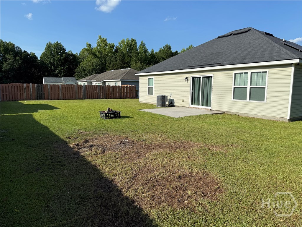 102 Black Pine Drive Springfield, GA 31329 - Photo 9 of 13 Large Back yard with grilling patio.