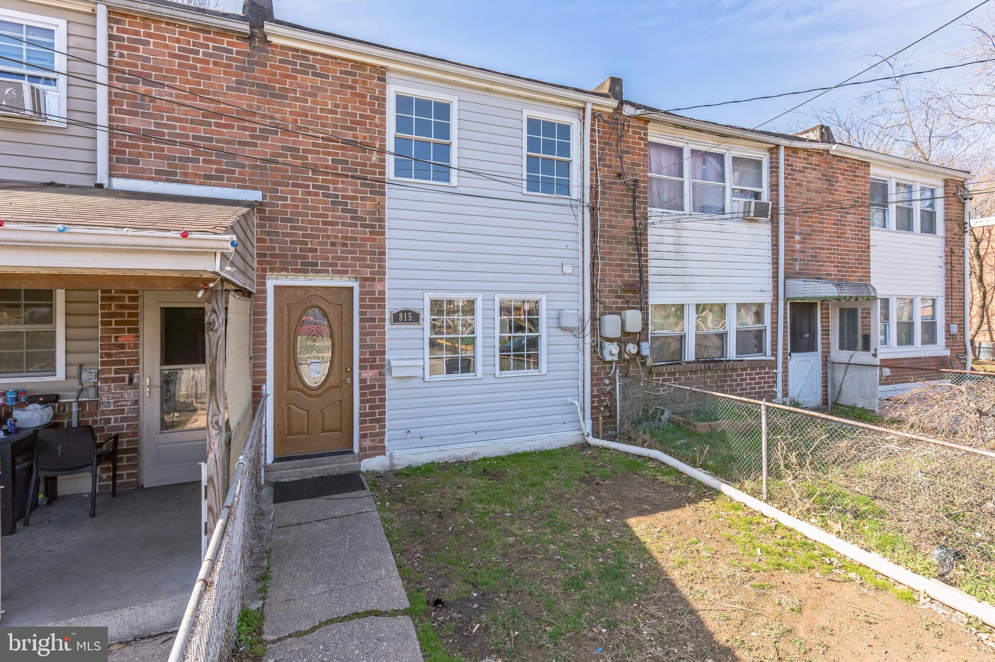 815 Fifth Avenue Baltimore, MD 21227 - Photo 1 of 17 a front view of a house with a yard