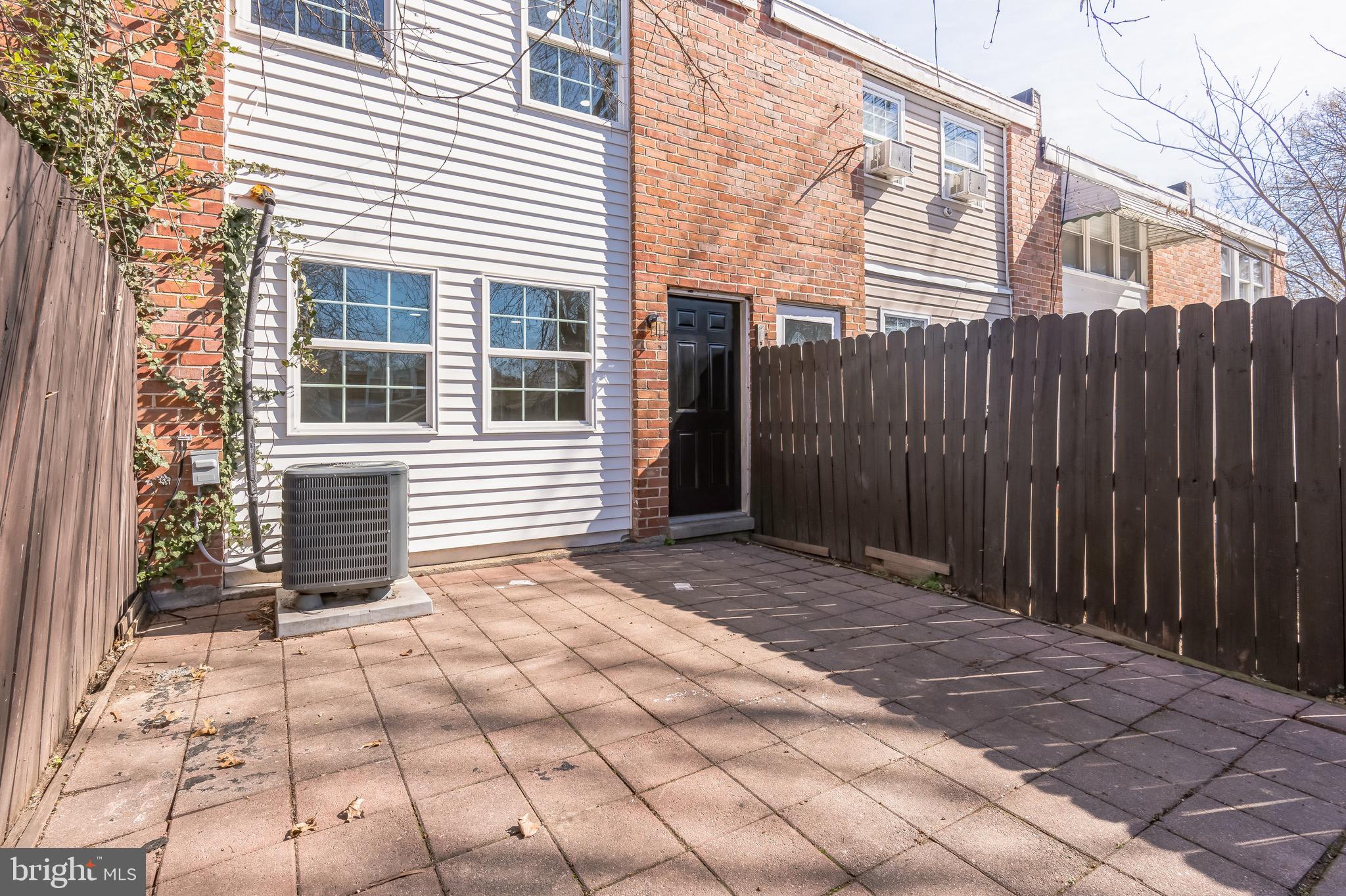 815 Fifth Avenue Baltimore, MD 21227 - Photo 17 of 17 a view of a backyard with sitting area