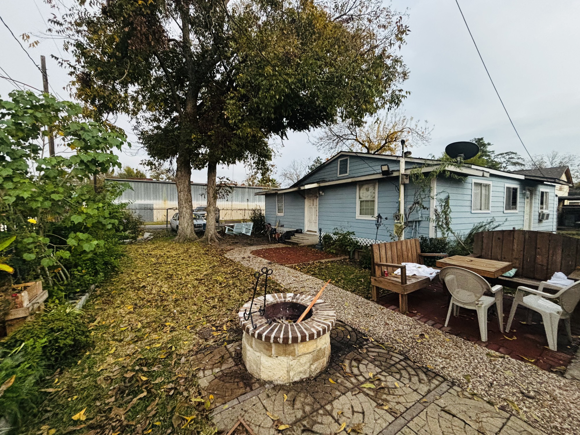 920 Frisco Street Houston, TX 77022 - Photo 6 of 11 a view of a patio with table and chairs and potted plants