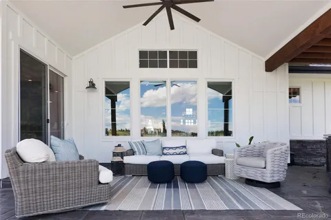 a outdoor living space with patio furniture and a garden