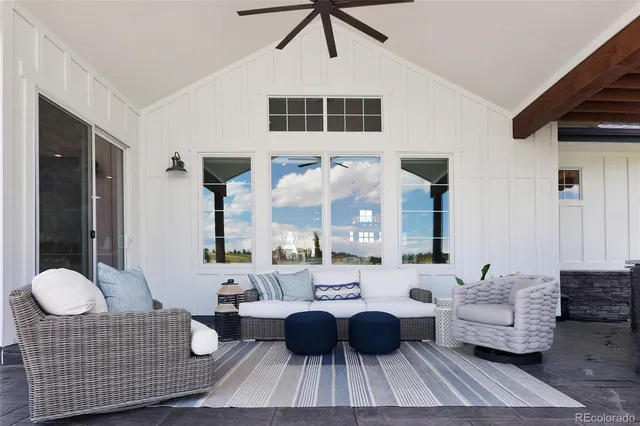 a outdoor living space with patio furniture and a garden