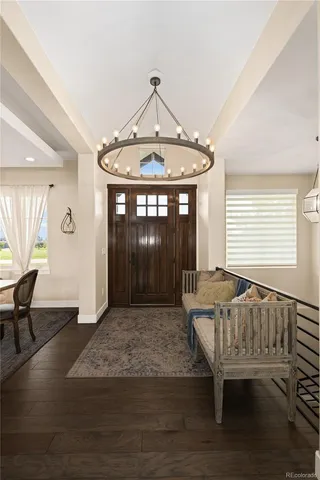 a view of a livingroom with furniture and window