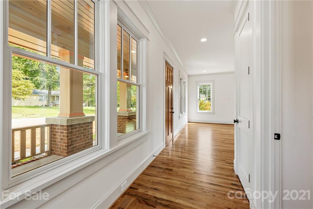 3807 Plainview Road Charlotte, NC 28208 - Photo 13 of 28 a view of a hallway with windows