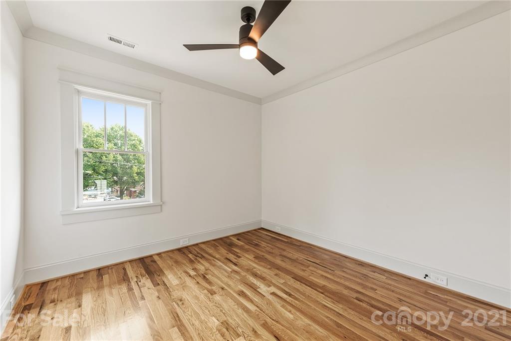 3807 Plainview Road Charlotte, NC 28208 - Photo 21 of 28 a view of empty room with ceiling fan