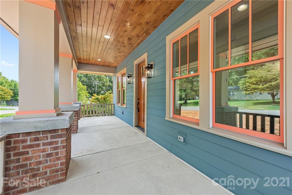 3807 Plainview Road Charlotte, NC 28208 - Photo 24 of 28 a living room filled with furniture and a window