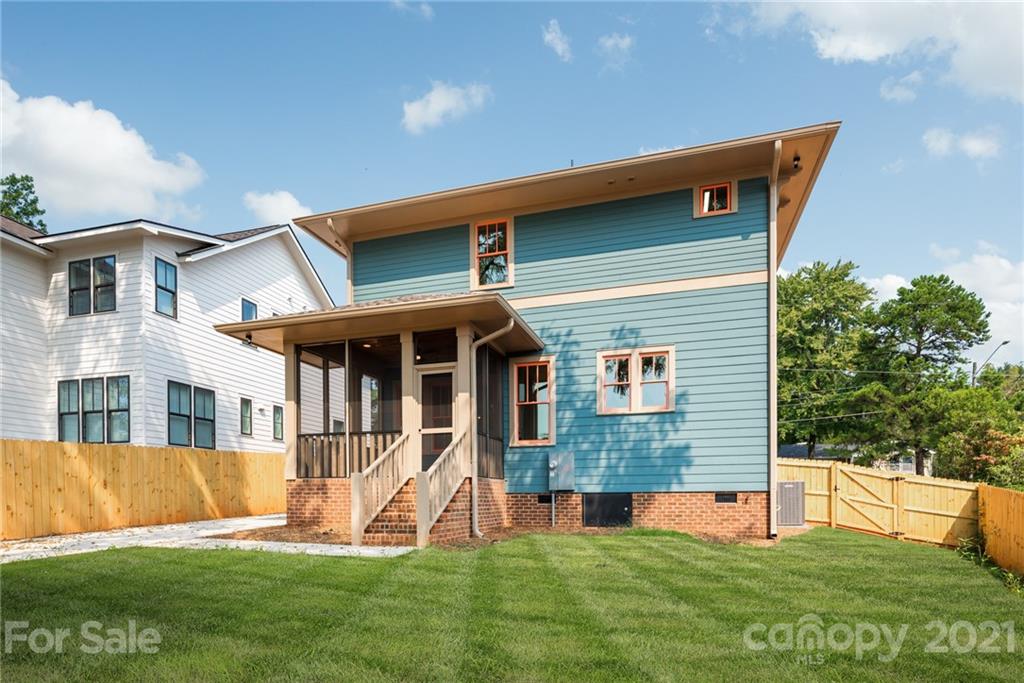3807 Plainview Road Charlotte, NC 28208 - Photo 26 of 28 a front view of a house with a yard