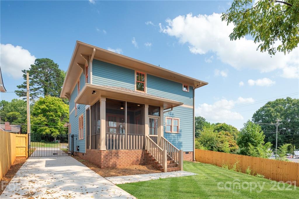 3807 Plainview Road Charlotte, NC 28208 - Photo 27 of 28 a view of a house with a yard