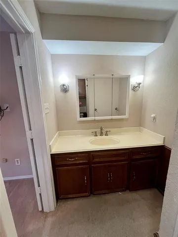 a bathroom with a toilet and a sink