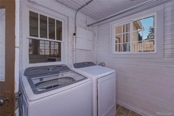 a utility room with dryer and washer