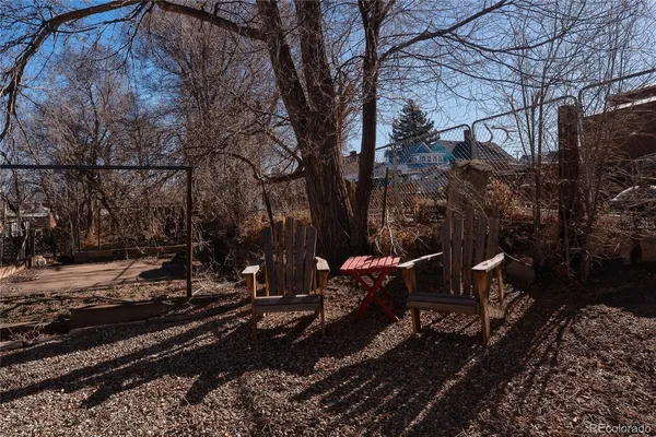 a view of a house with backyard and a sink
