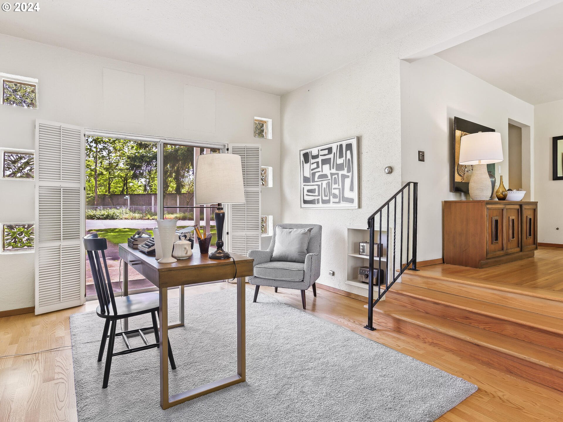 6937 Northeast Broadway Portland, OR 97213 - Photo 14 of 48 a living room with furniture and a large window