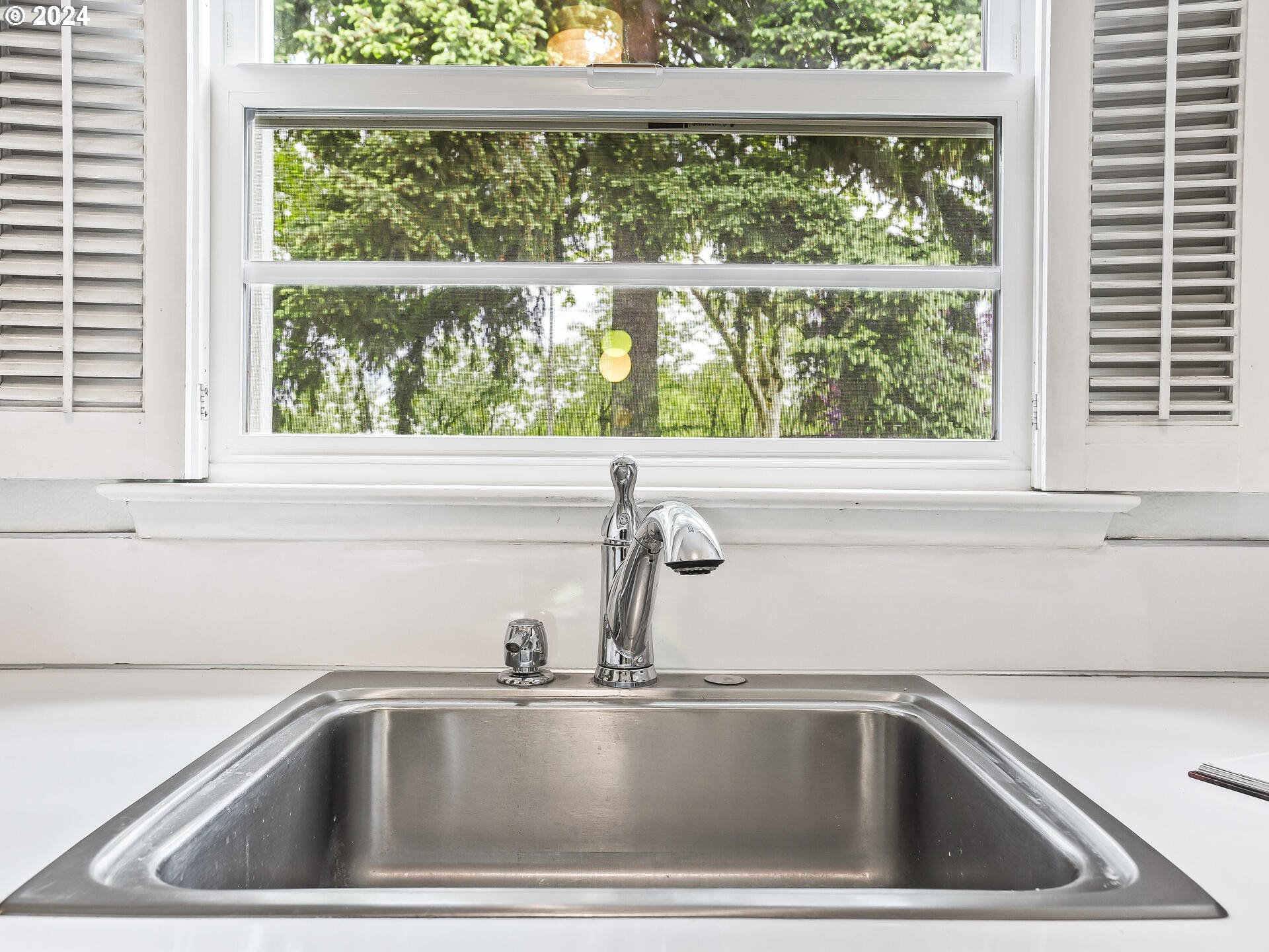 6937 Northeast Broadway Portland, OR 97213 - Photo 20 of 48 a view closeup a sink and a window