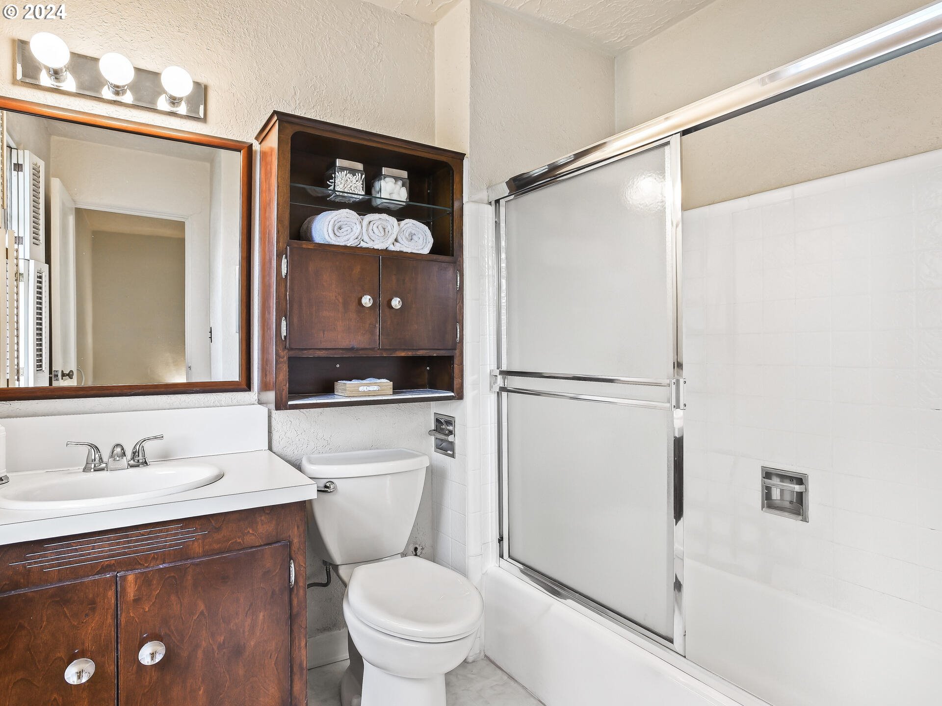 6937 Northeast Broadway Portland, OR 97213 - Photo 25 of 48 a bathroom with a sink toilet and shower