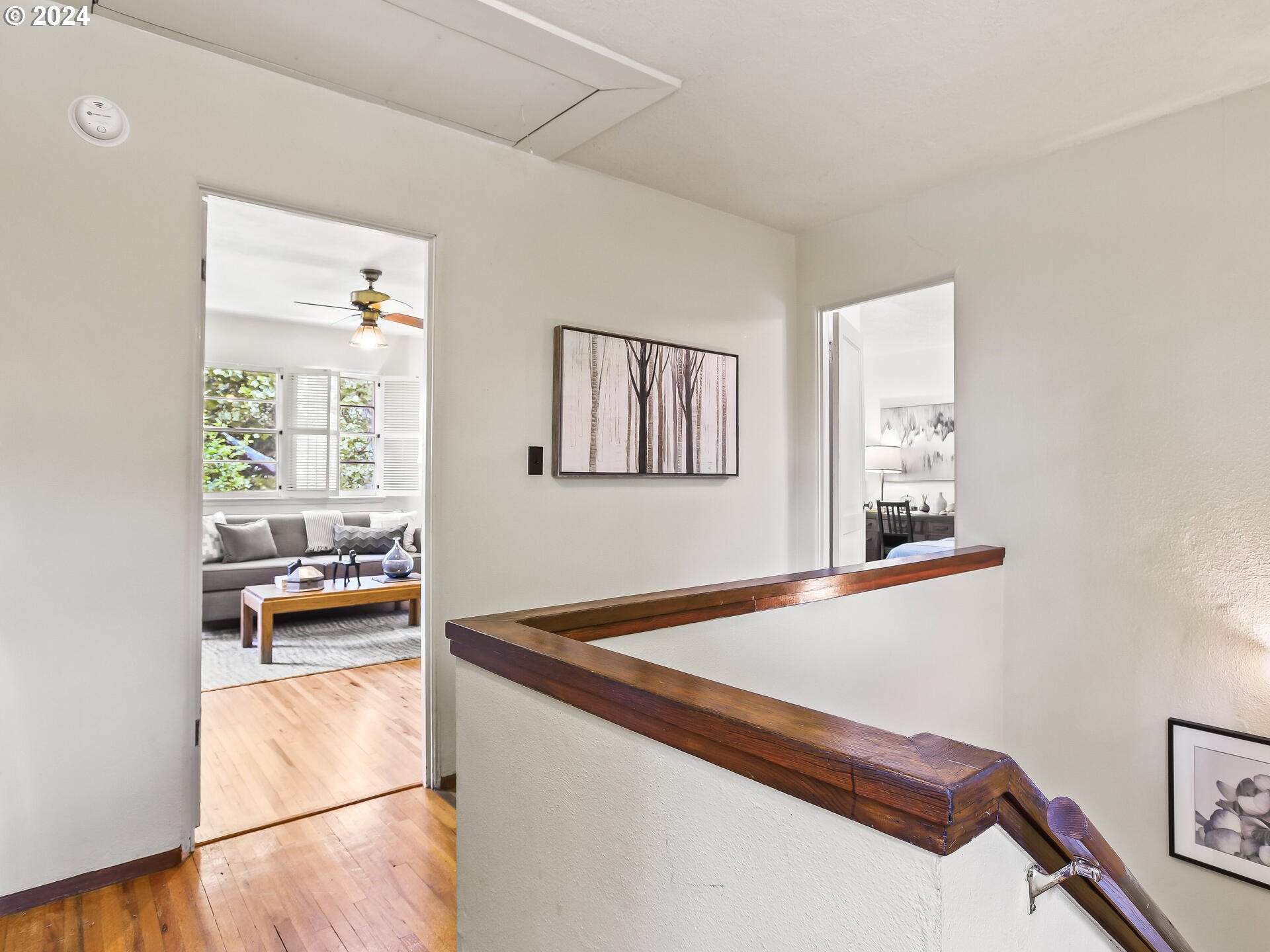 6937 Northeast Broadway Portland, OR 97213 - Photo 26 of 48 a view of hallway with furniture and a window