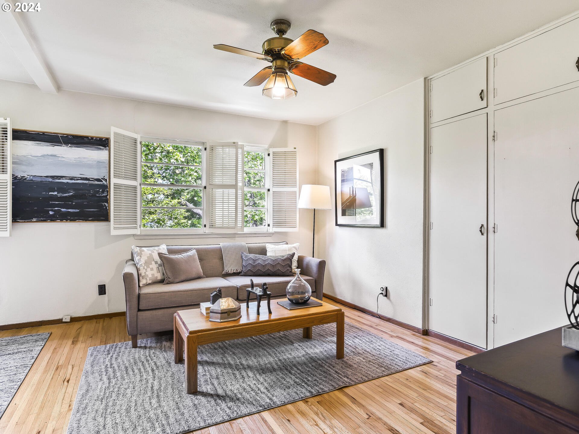 6937 Northeast Broadway Portland, OR 97213 - Photo 27 of 48 a living room with furniture and a window