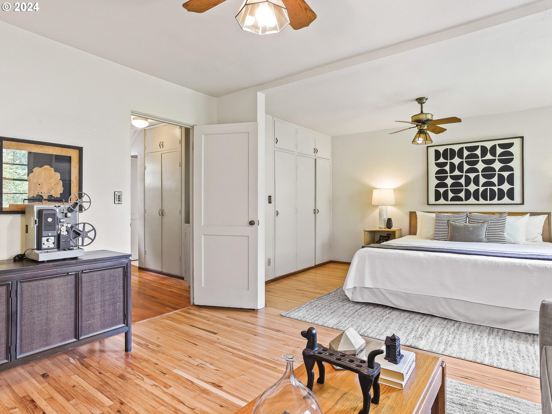 6937 Northeast Broadway Portland, OR 97213 - Photo 28 of 48 a living room with furniture and a wooden floor