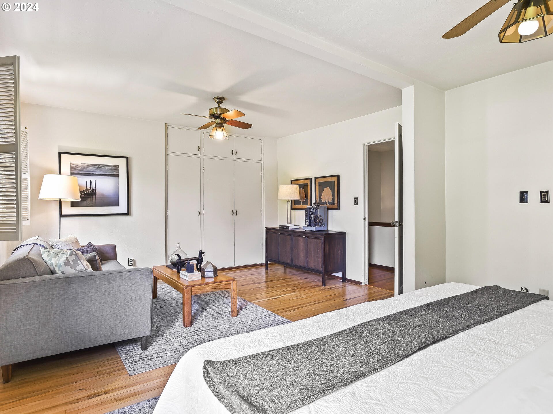6937 Northeast Broadway Portland, OR 97213 - Photo 31 of 48 a living room with furniture and a wooden floor