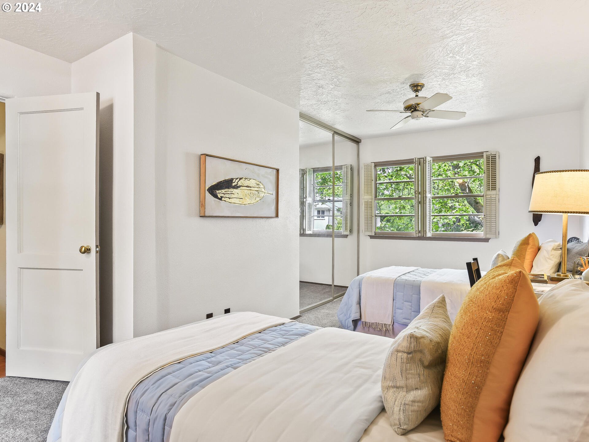 6937 Northeast Broadway Portland, OR 97213 - Photo 33 of 48 a bedroom with a bed and a window