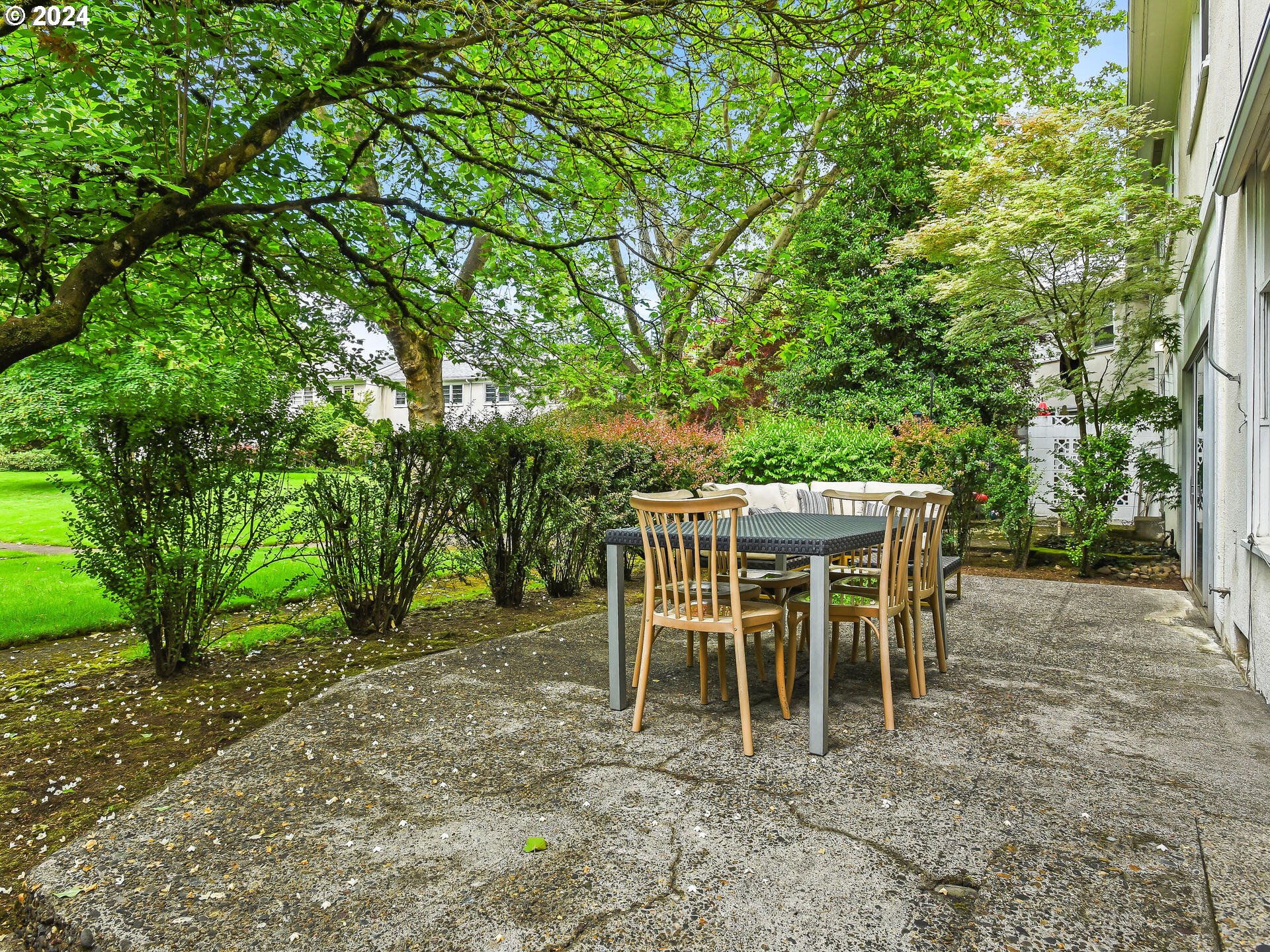 6937 Northeast Broadway Portland, OR 97213 - Photo 40 of 48 a view of a dining room with furniture and wooden floor