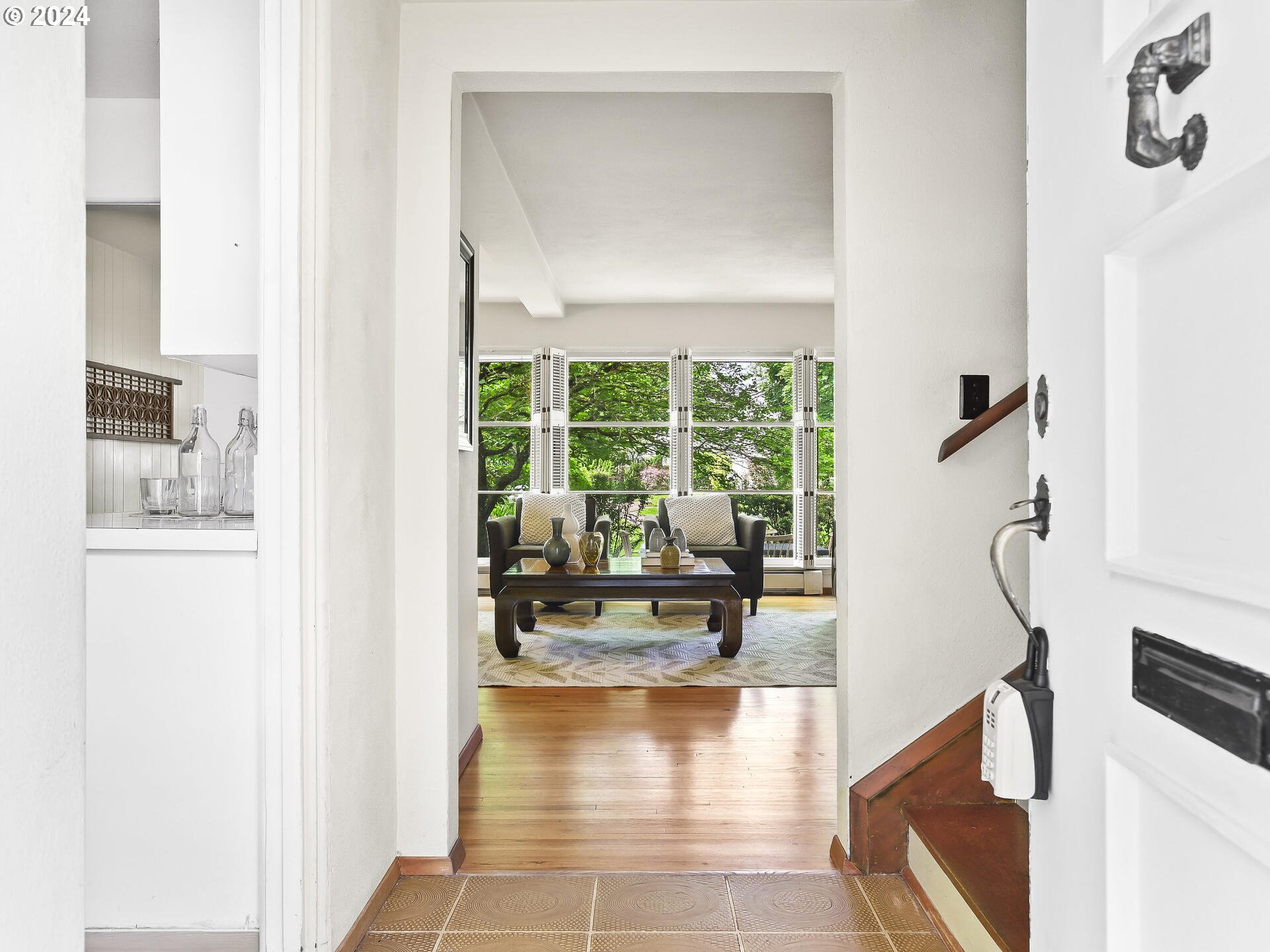 6937 Northeast Broadway Portland, OR 97213 - Photo 4 of 48 a view of living room with furniture and floor to ceiling window