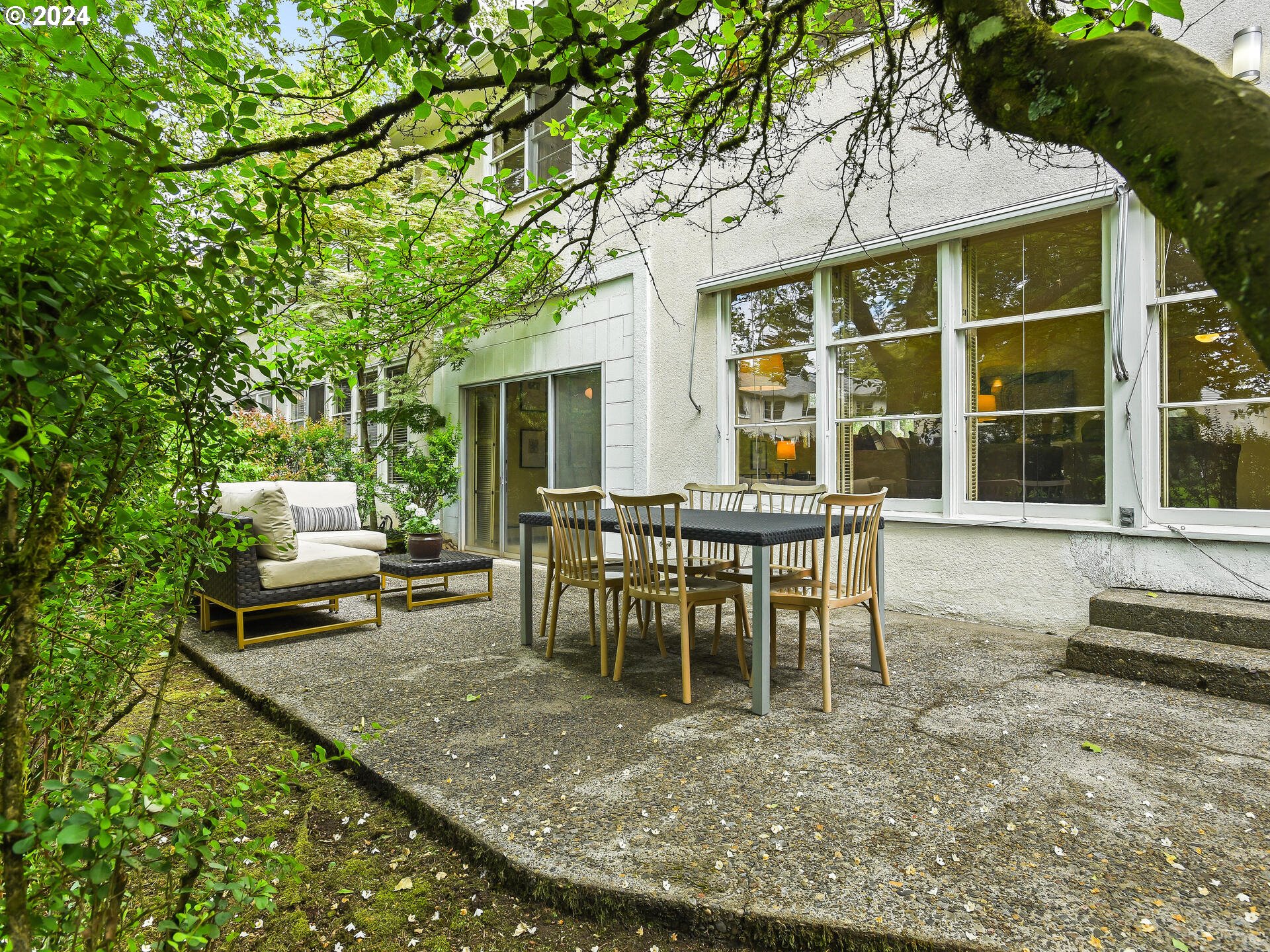 6937 Northeast Broadway Portland, OR 97213 - Photo 41 of 48 a view of a house with backyard porch and sitting area