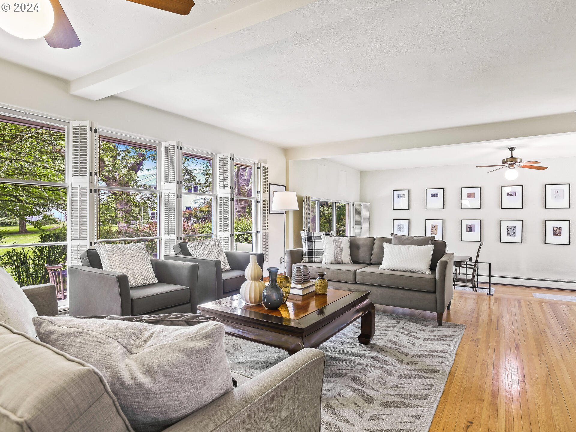6937 Northeast Broadway Portland, OR 97213 - Photo 6 of 48 a living room with furniture and a large window