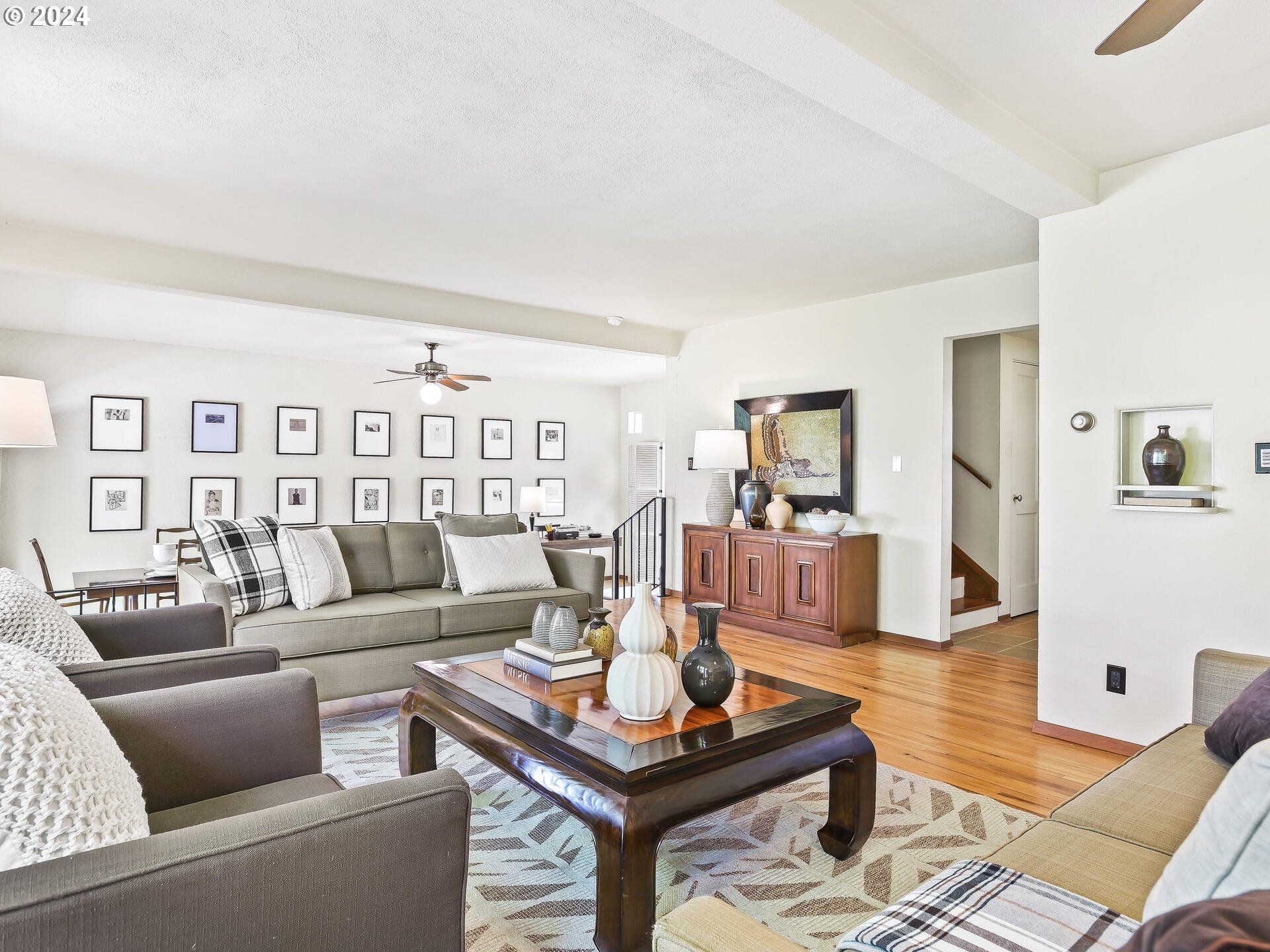 6937 Northeast Broadway Portland, OR 97213 - Photo 7 of 48 a living room with furniture and wooden floor