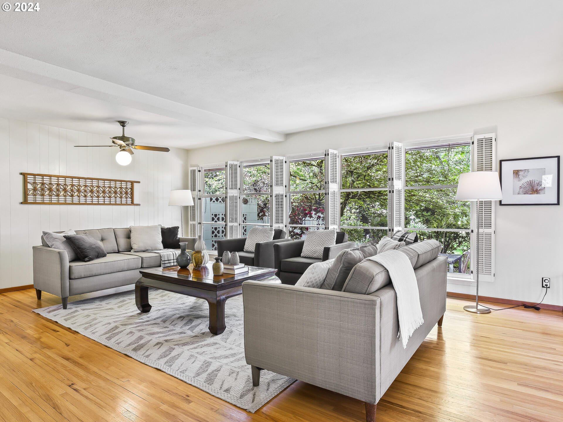 6937 Northeast Broadway Portland, OR 97213 - Photo 8 of 48 a living room with furniture and a large window