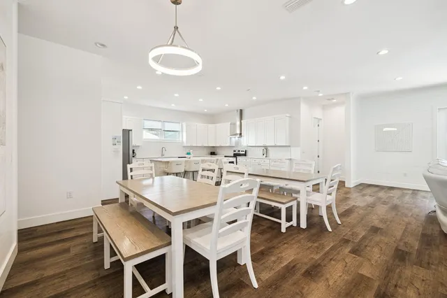 a front view of house with yard slide and outdoor seating