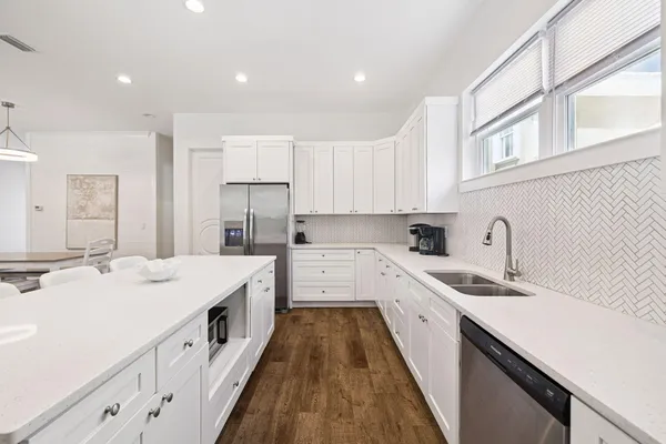 a front view of house with yard slide and outdoor seating