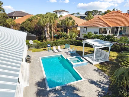 a bathroom with a granite countertop sink toilet tub and shower