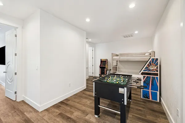 a view of a wooden door and a yard
