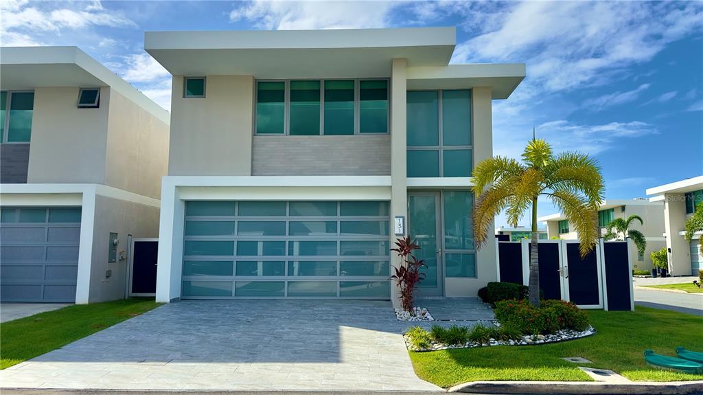 Urb Riviera Village Urb Riviera Village Bayamon, PR 00959 - Photo 1 of 1 a front view of a house with a yard