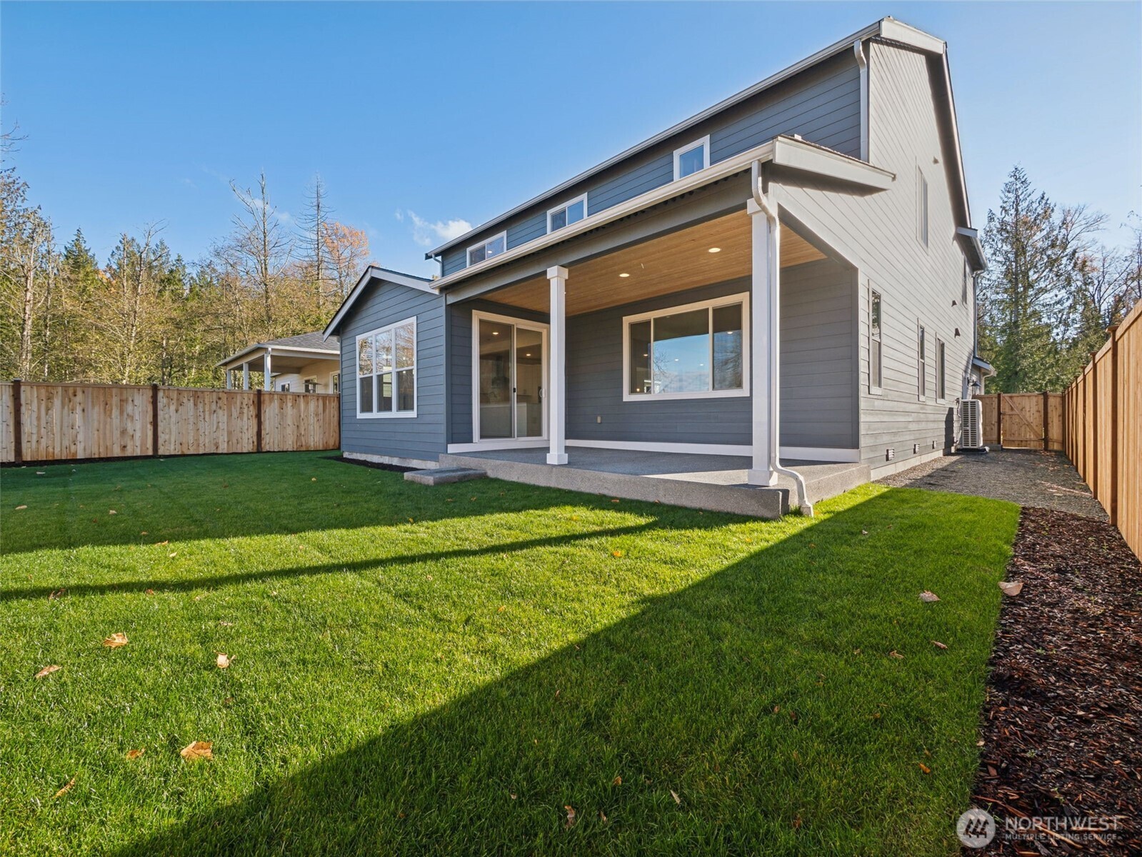 1132 Tanner Avenue, Unit 111 Buckley, WA 98321 - Photo 17 of 17 a front view of house with yard and green space