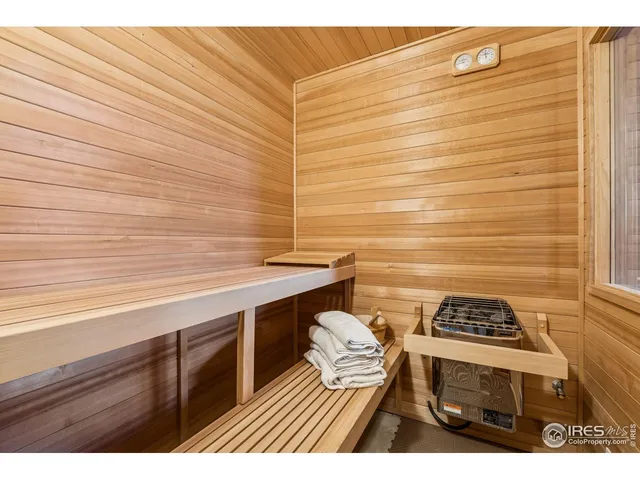 a bedroom with a bed and a view of bedroom