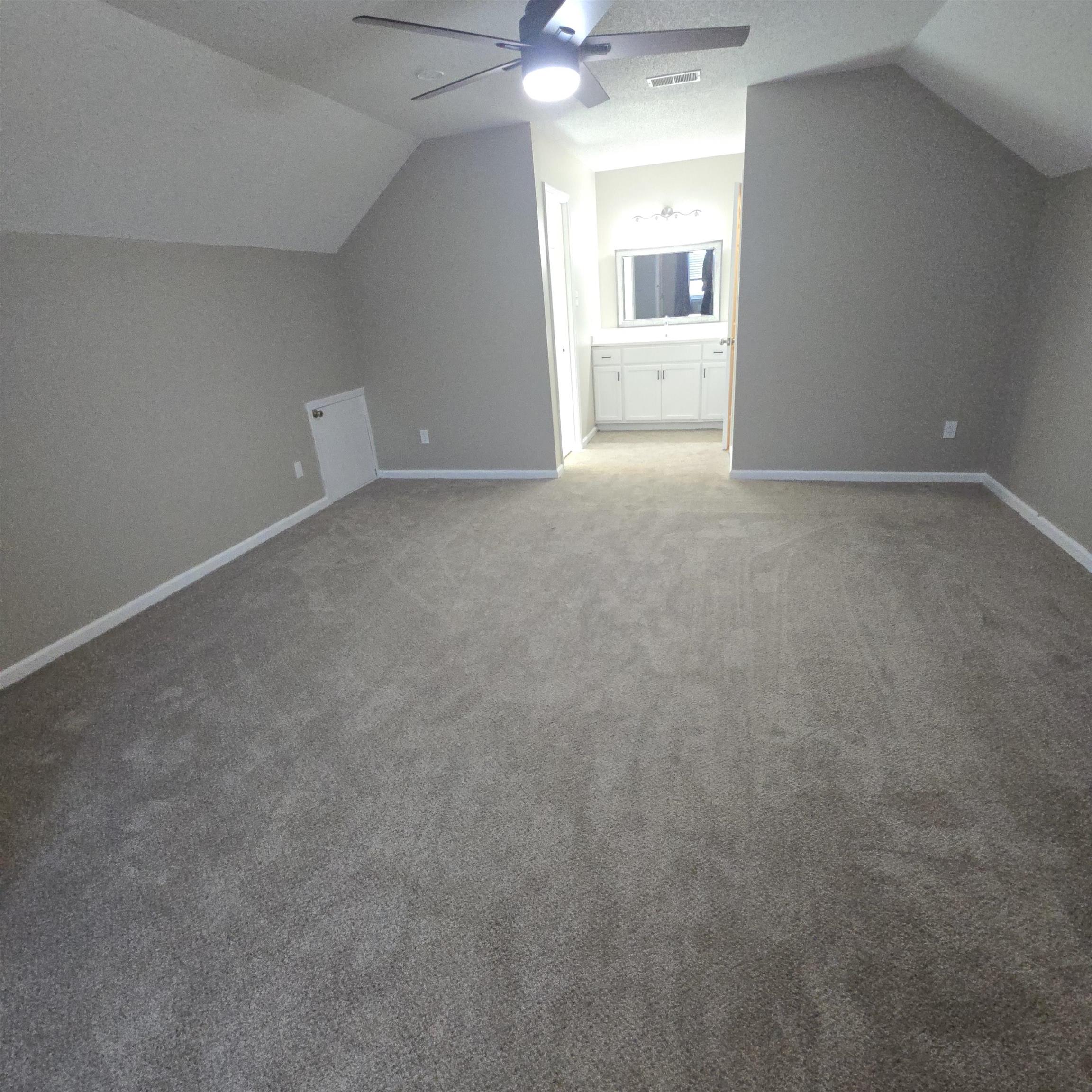 2317 Belin Drive Memphis, TN 38133 - Photo 13 of 14 a view of an empty room with a kitchen