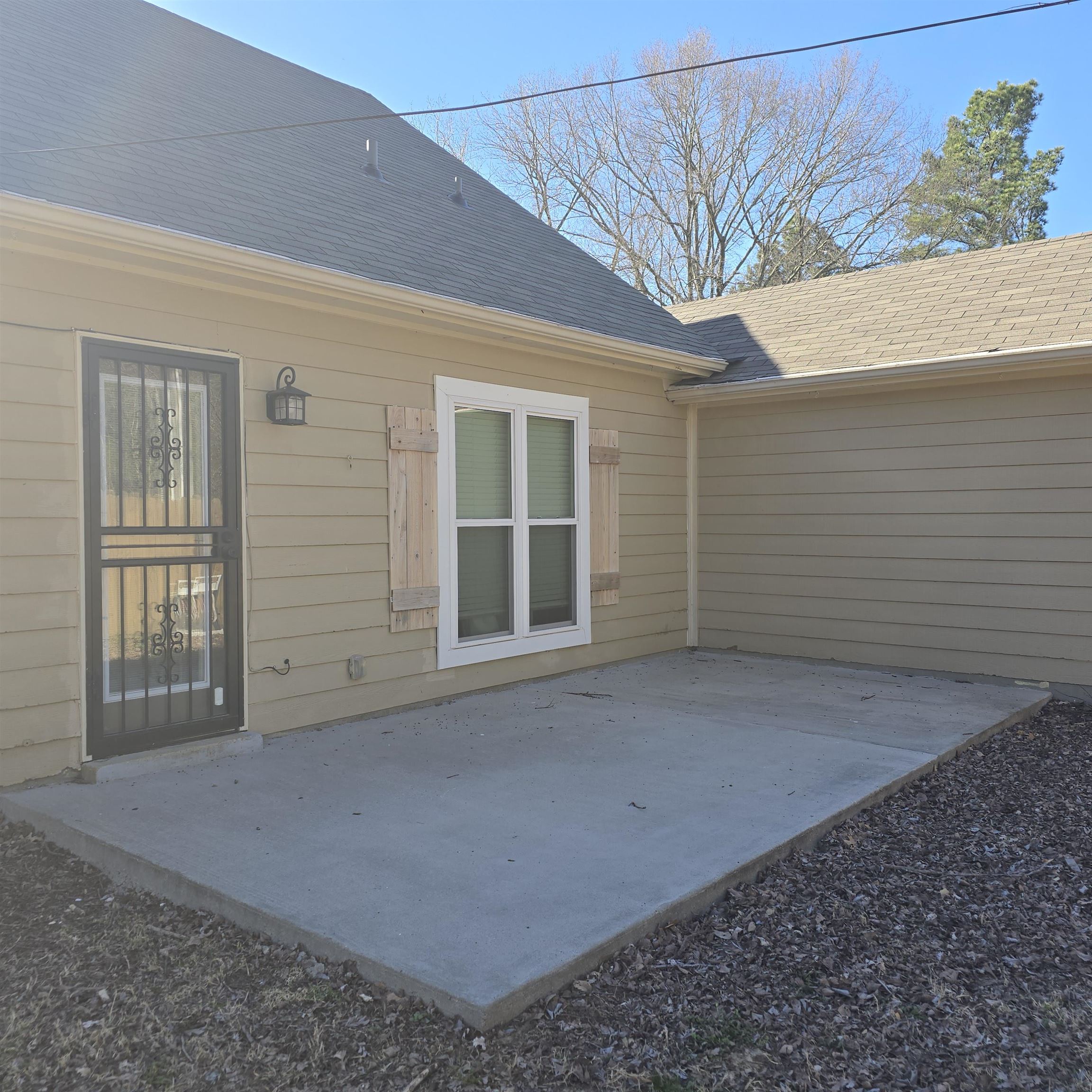 2317 Belin Drive Memphis, TN 38133 - Photo 2 of 14 a view of a house with a tree