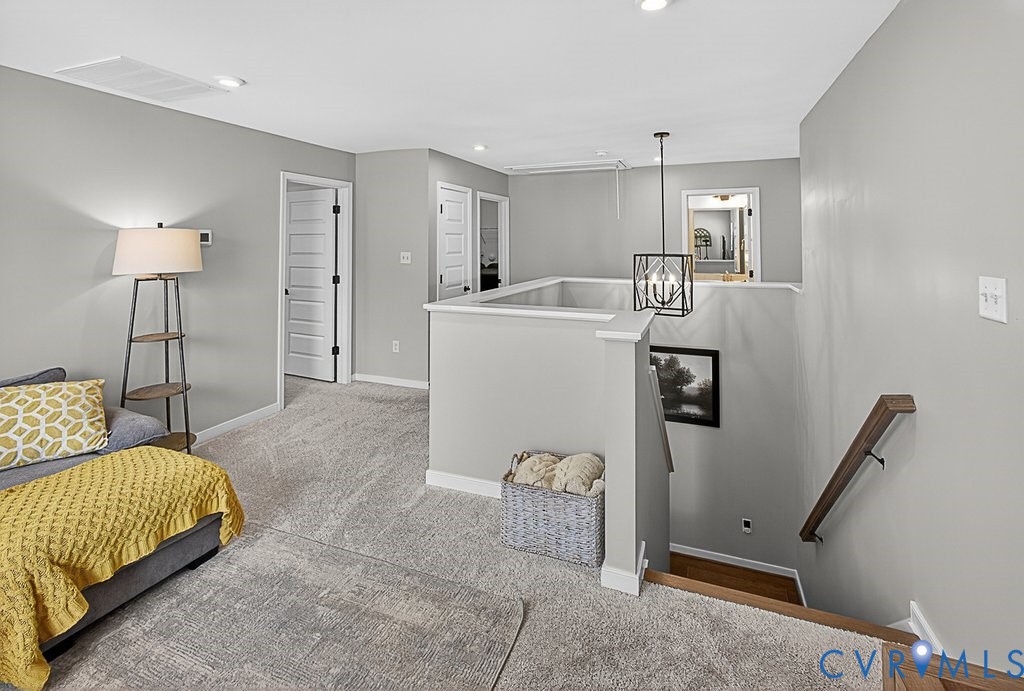 18517 Palisades Ridge Moseley, VA 23120 - Photo 20 of 55 a living room with furniture and a table