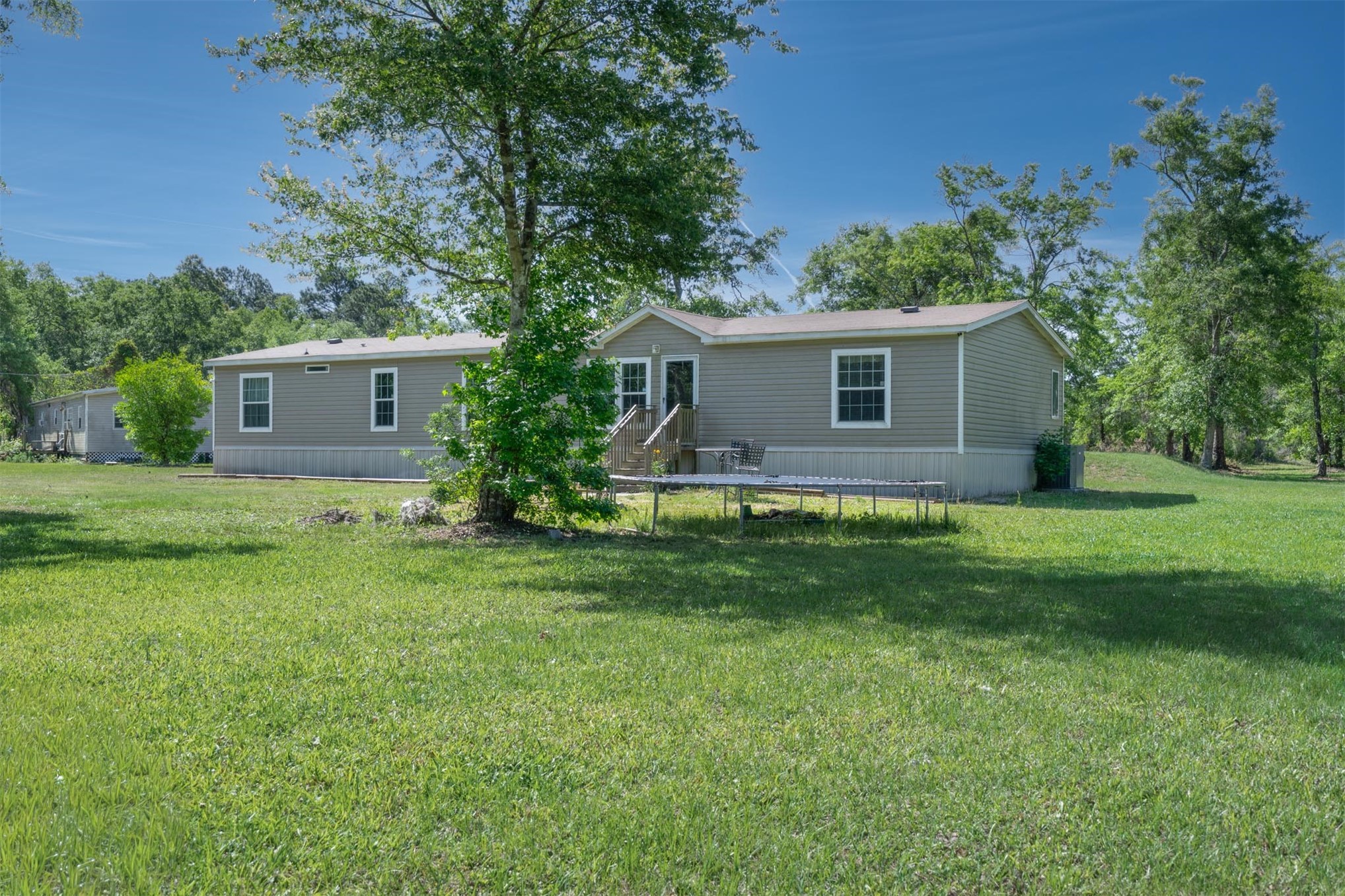 76220 Dove Road Yulee, FL 32097 - Photo 10 of 48 a house view with a garden space