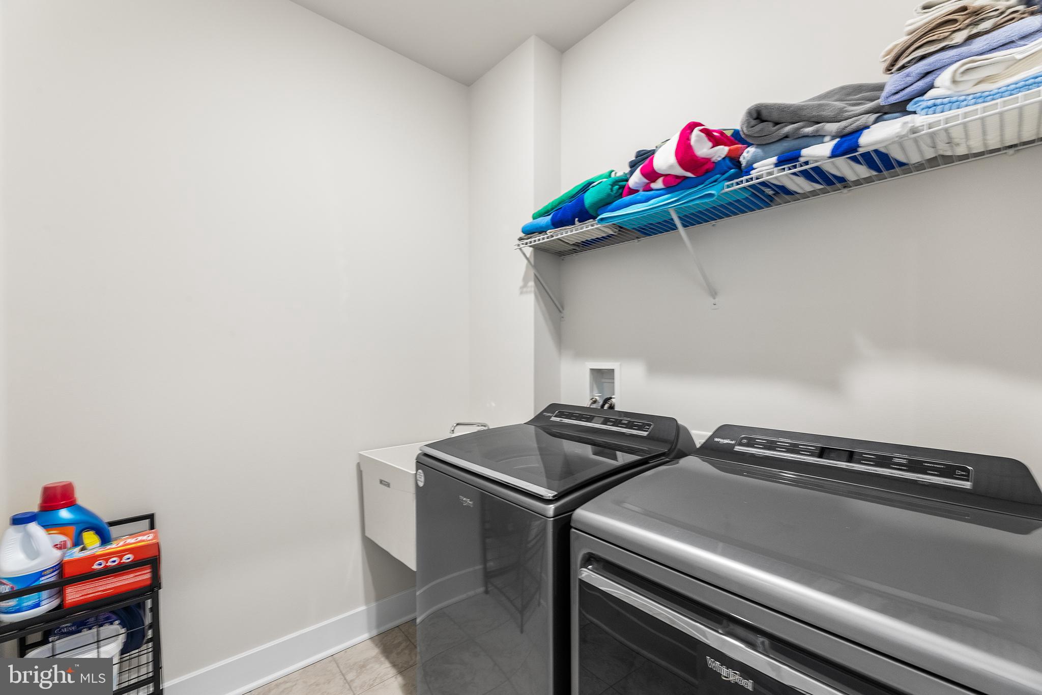 29255 Baker Island Road Lewes, DE 19958 - Photo 23 of 56 a utility room with dryer and washer