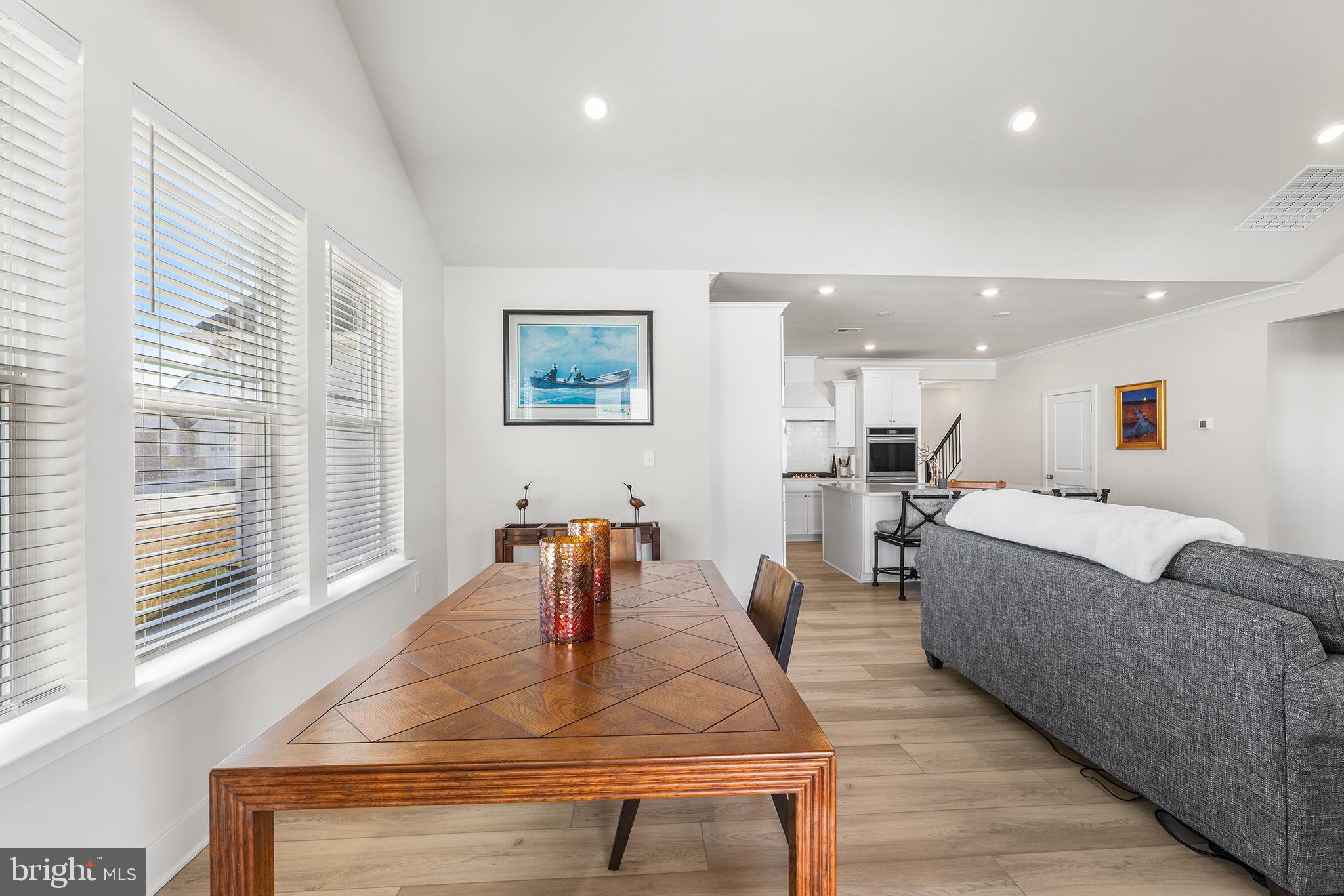 29255 Baker Island Road Lewes, DE 19958 - Photo 27 of 56 a living room with furniture and a table