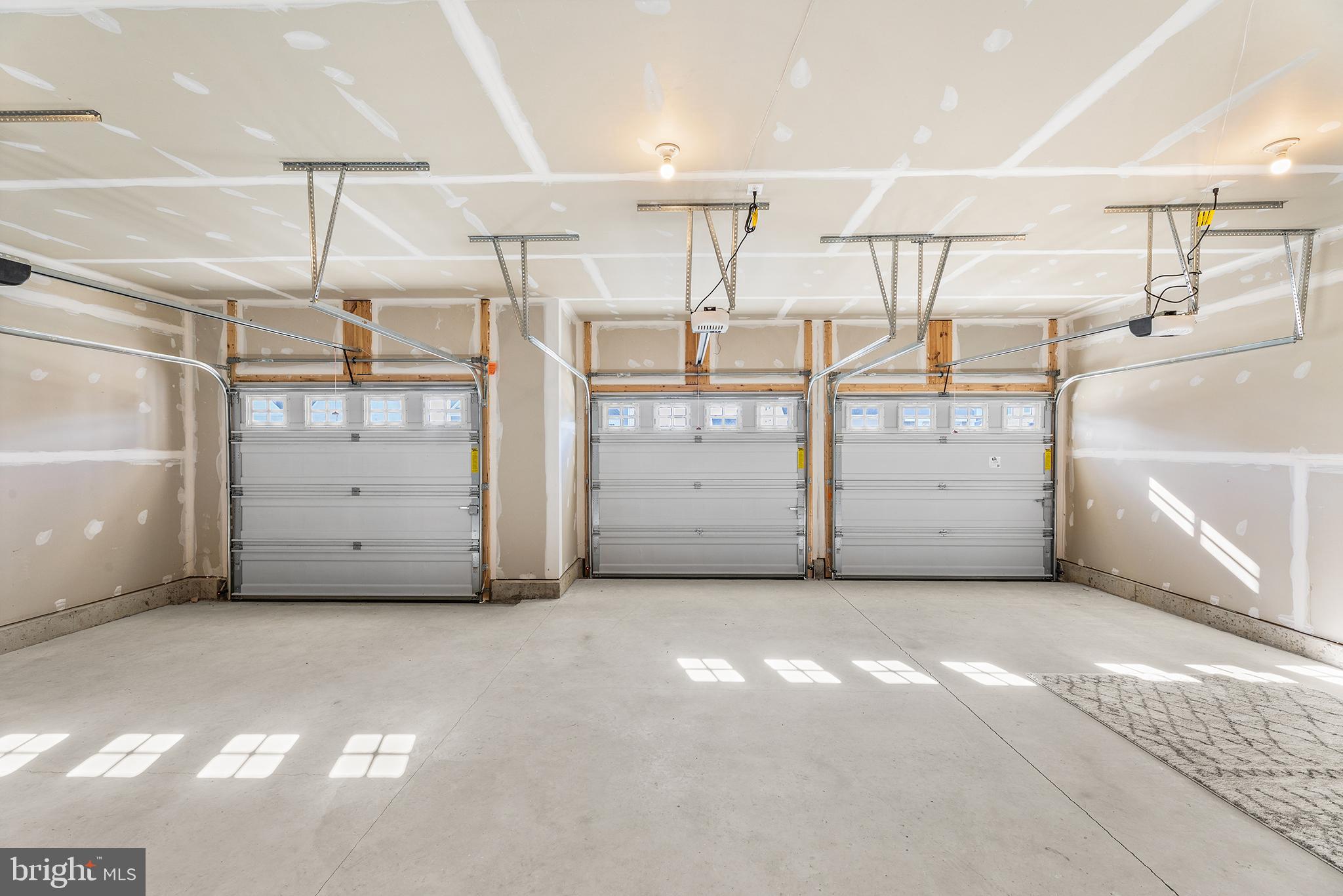 29255 Baker Island Road Lewes, DE 19958 - Photo 56 of 56 a view of a garage with storage